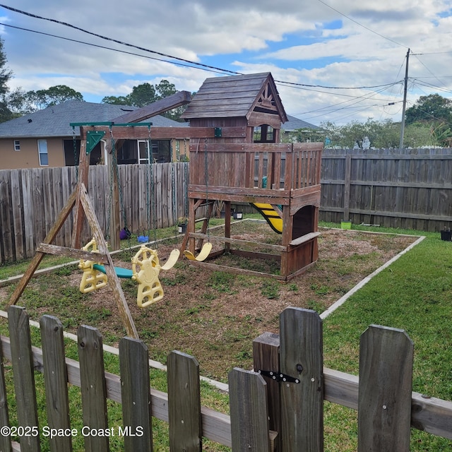 view of play area with a lawn