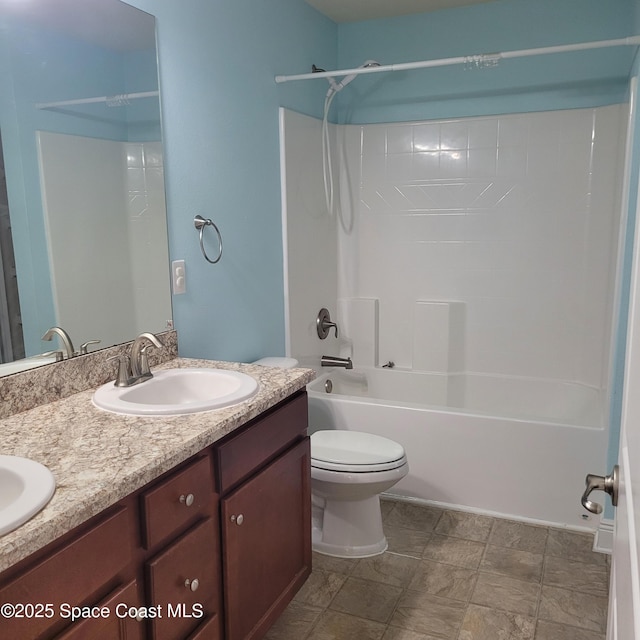 full bathroom with vanity, bathtub / shower combination, and toilet