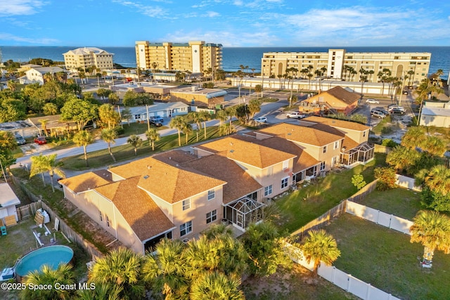 birds eye view of property featuring a water view