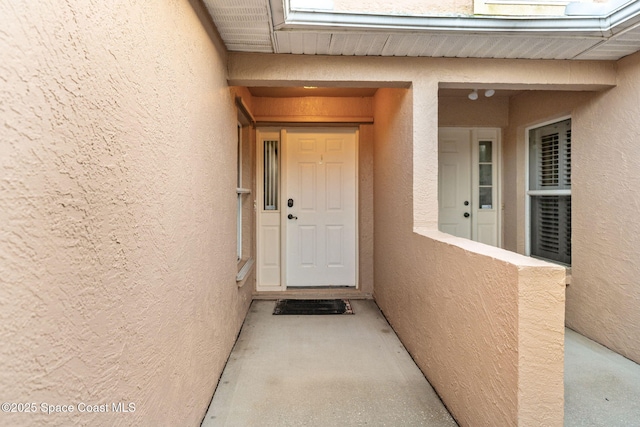 property entrance with a balcony