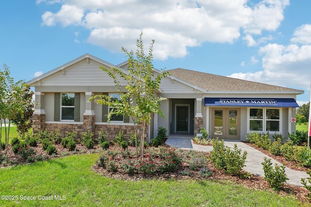 view of front of home featuring a front lawn