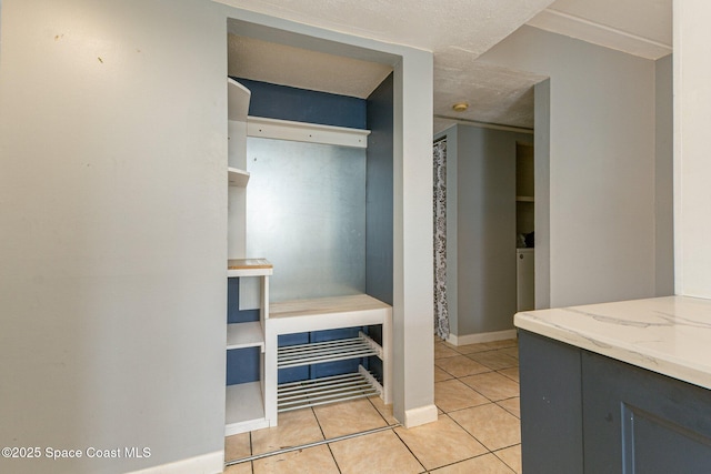 mudroom featuring light tile patterned floors