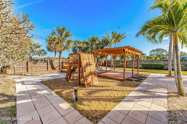 view of play area featuring a pergola