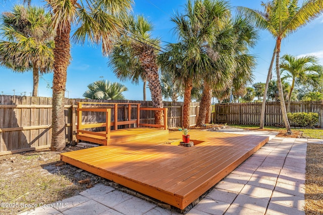 view of patio with a wooden deck