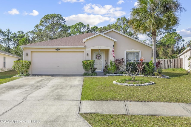 single story home featuring a garage and a front lawn