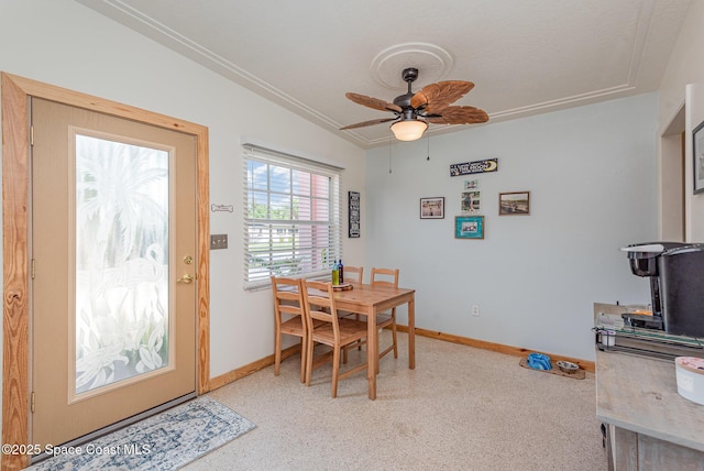 dining room featuring ceiling fan and lofted ceiling