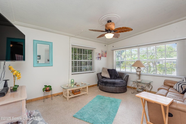 sitting room featuring a textured ceiling, ceiling fan, lofted ceiling, and crown molding