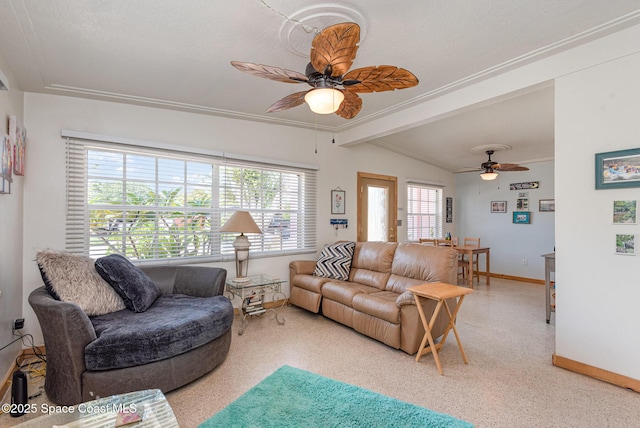 living room featuring ceiling fan and lofted ceiling with beams