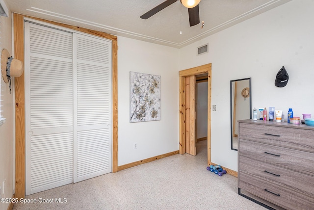 bedroom with a closet and ceiling fan