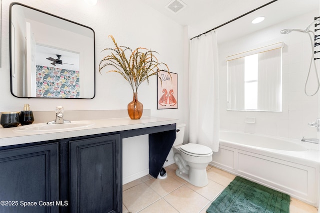 full bathroom with shower / bath combo, vanity, tile patterned floors, ceiling fan, and toilet