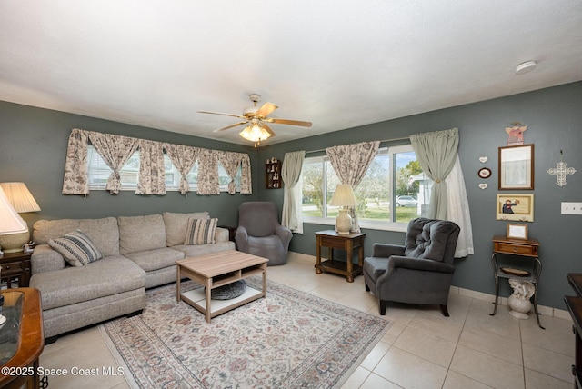 tiled living room featuring ceiling fan