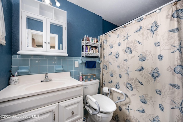 bathroom featuring toilet, tasteful backsplash, tile walls, a shower with shower curtain, and vanity