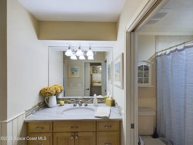 bathroom with a shower with curtain and vanity