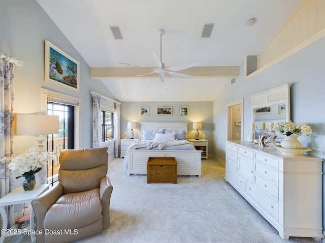 bedroom with ceiling fan, lofted ceiling with beams, and light carpet