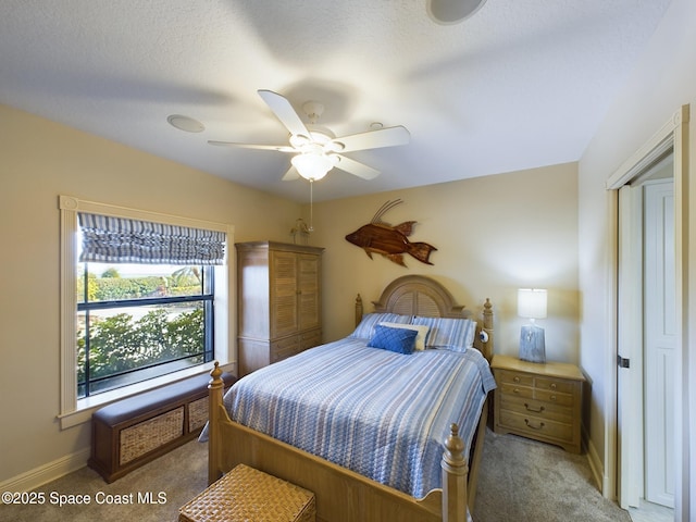 bedroom featuring carpet and ceiling fan