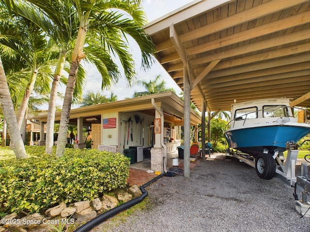 exterior space featuring a carport