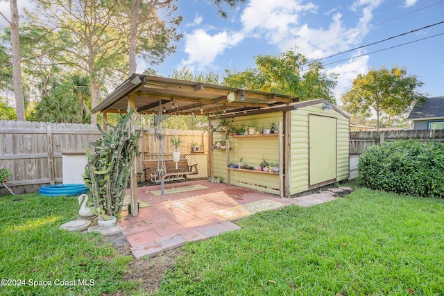 view of patio featuring a storage shed