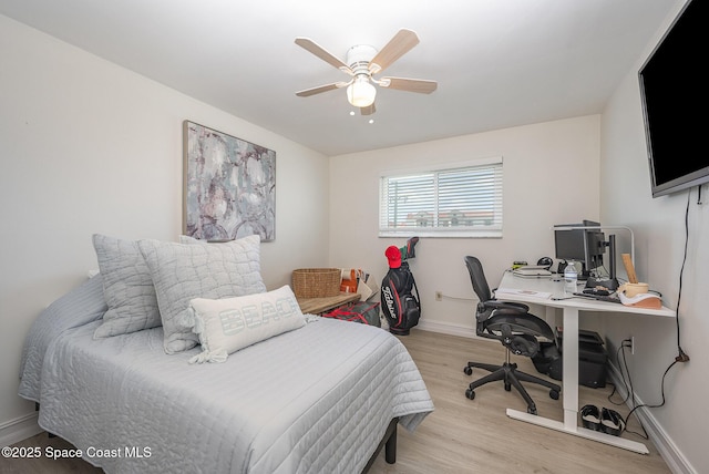 bedroom featuring ceiling fan and light hardwood / wood-style floors