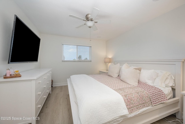 bedroom featuring ceiling fan and light wood-type flooring