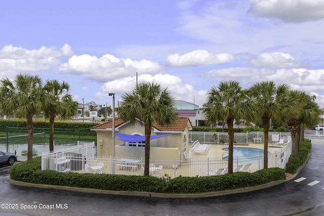 view of home's community with a swimming pool