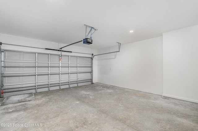 garage featuring a garage door opener