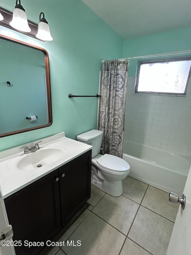 full bathroom with tile patterned flooring, vanity, toilet, and shower / bath combo with shower curtain