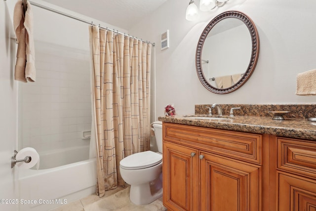 full bathroom featuring tile patterned floors, vanity, shower / bath combination with curtain, and toilet