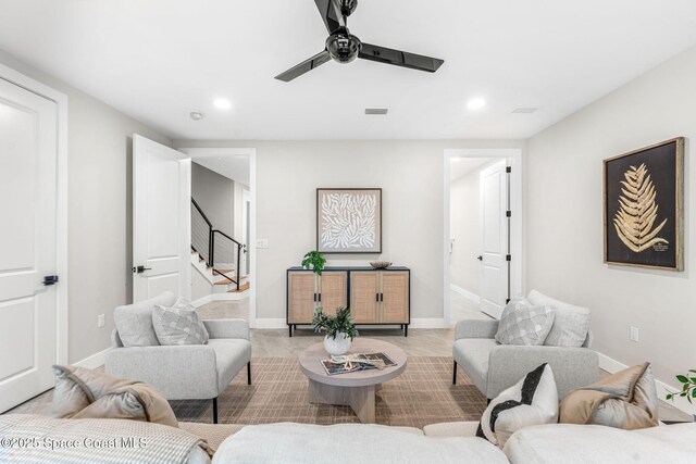 living room featuring ceiling fan