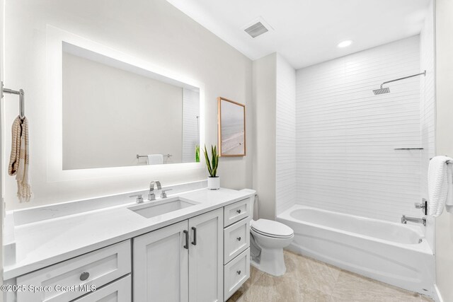 full bathroom featuring shower / bathing tub combination, toilet, and vanity