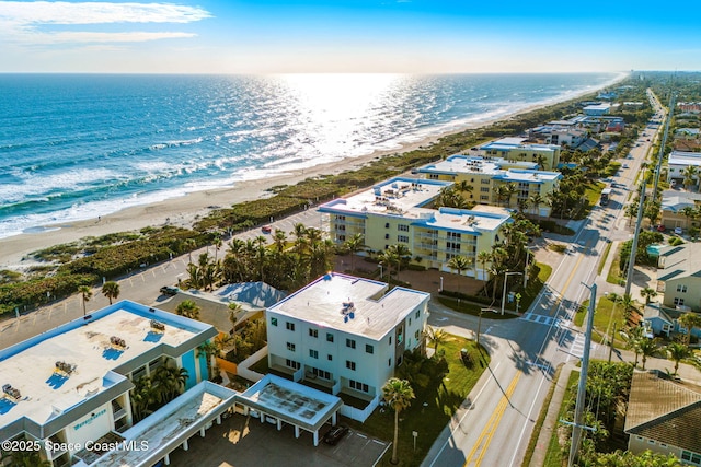 bird's eye view with a view of the beach and a water view