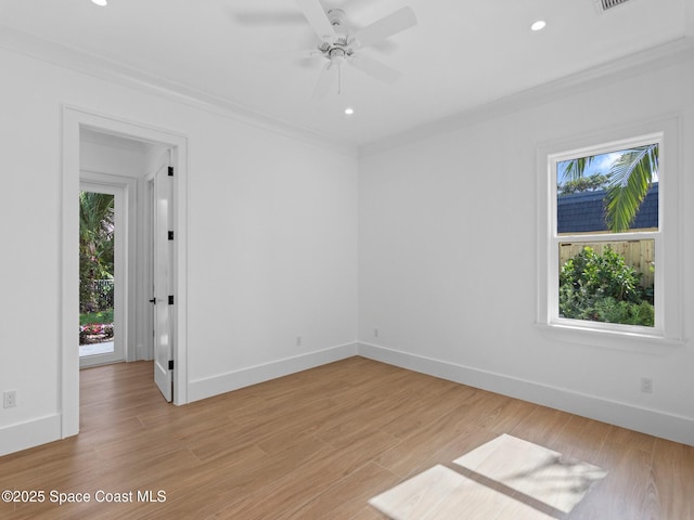 empty room with recessed lighting, baseboards, and light wood-type flooring