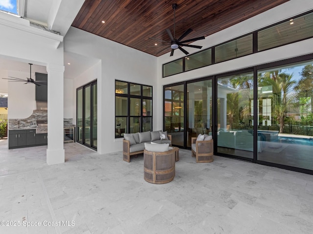 view of patio / terrace featuring an outdoor living space, grilling area, an outdoor pool, and ceiling fan