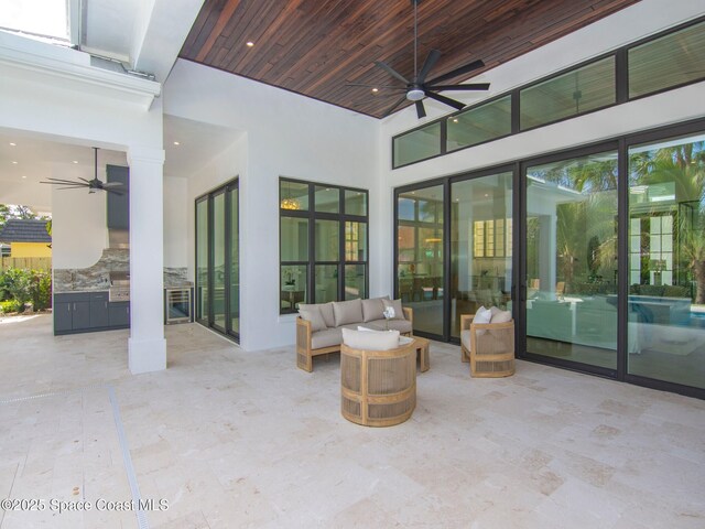 view of patio / terrace with an outdoor hangout area and ceiling fan