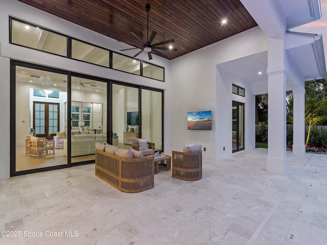 view of patio / terrace with a ceiling fan, french doors, and an outdoor hangout area