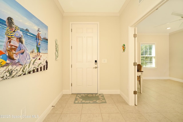 tiled entrance foyer with crown molding