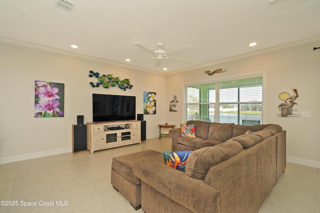 tiled living room with ceiling fan and ornamental molding