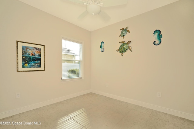 spare room featuring ceiling fan