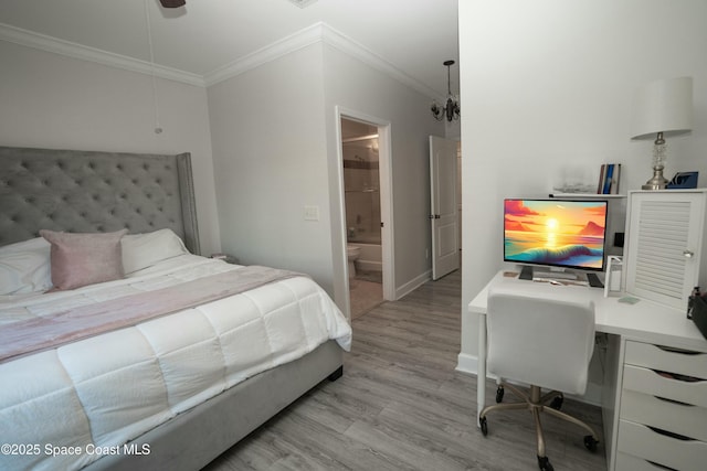 bedroom featuring ensuite bath, ceiling fan, light hardwood / wood-style floors, and ornamental molding