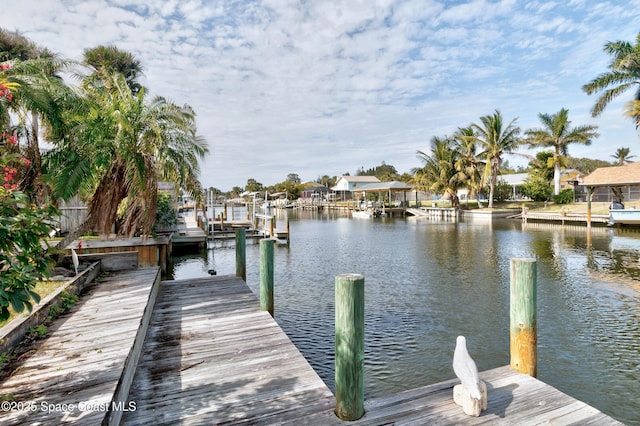 view of dock with a water view