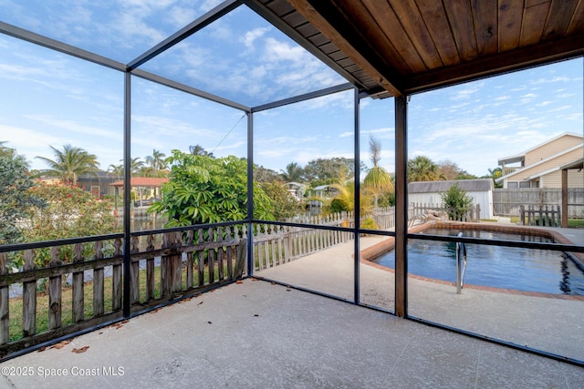 view of patio with a lanai and a fenced in pool