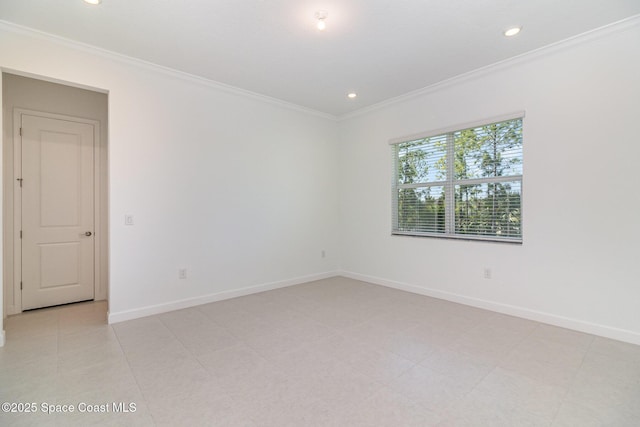 empty room featuring ornamental molding