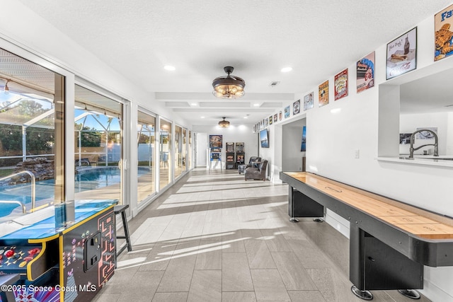 interior space with a textured ceiling