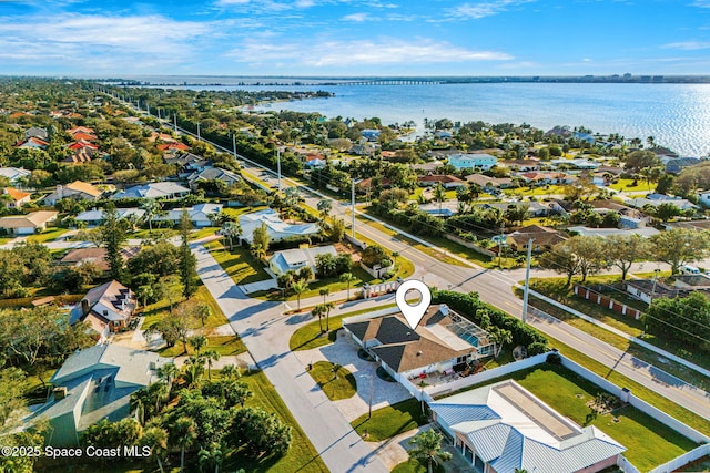 drone / aerial view featuring a water view