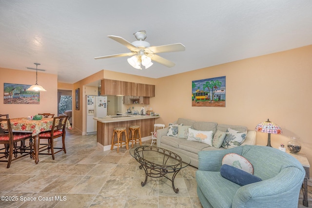 living room with ceiling fan