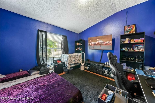 carpeted bedroom featuring a textured ceiling and vaulted ceiling