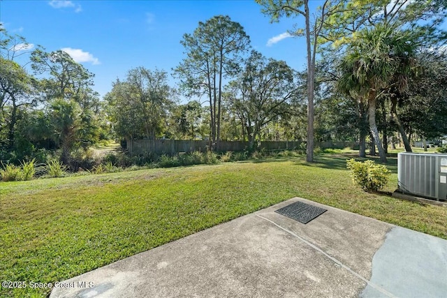 view of yard featuring central AC