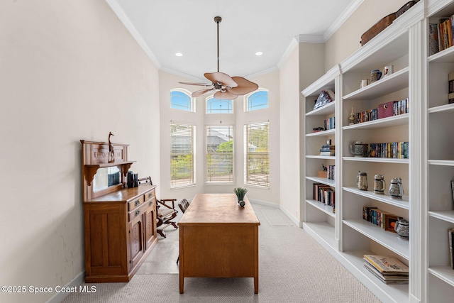 home office featuring light carpet, ornamental molding, and ceiling fan