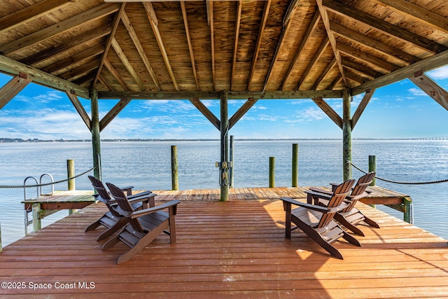 dock area with a water view and a gazebo