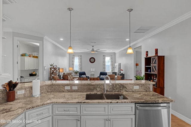 kitchen with ceiling fan, stainless steel dishwasher, white cabinets, light stone counters, and sink