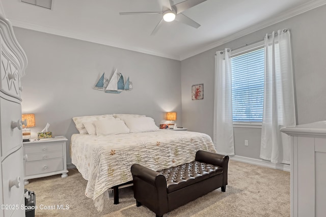 carpeted bedroom with ceiling fan, multiple windows, and crown molding